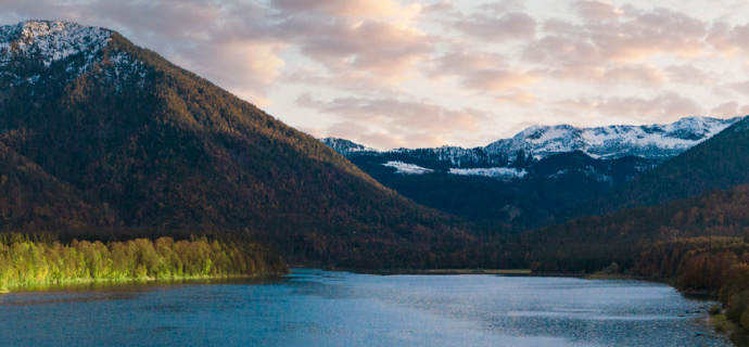 mountain range with lake in front